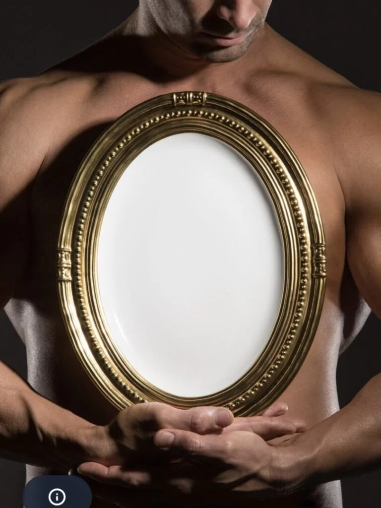 A male model holding an Oval mirror, styled by Victoria Callaway