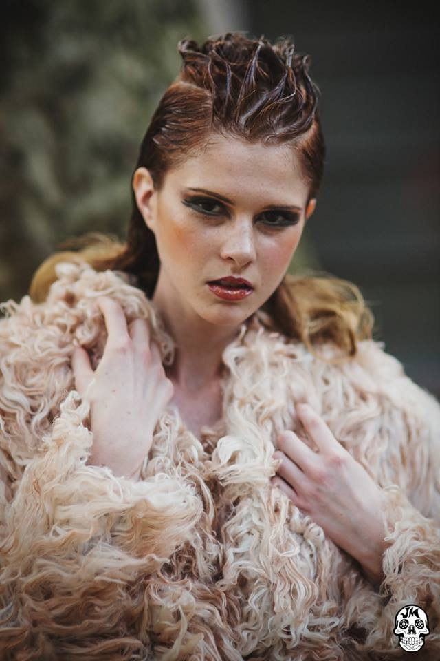 hairstyling and makeup by VCI artists on a model wearing a fur coat