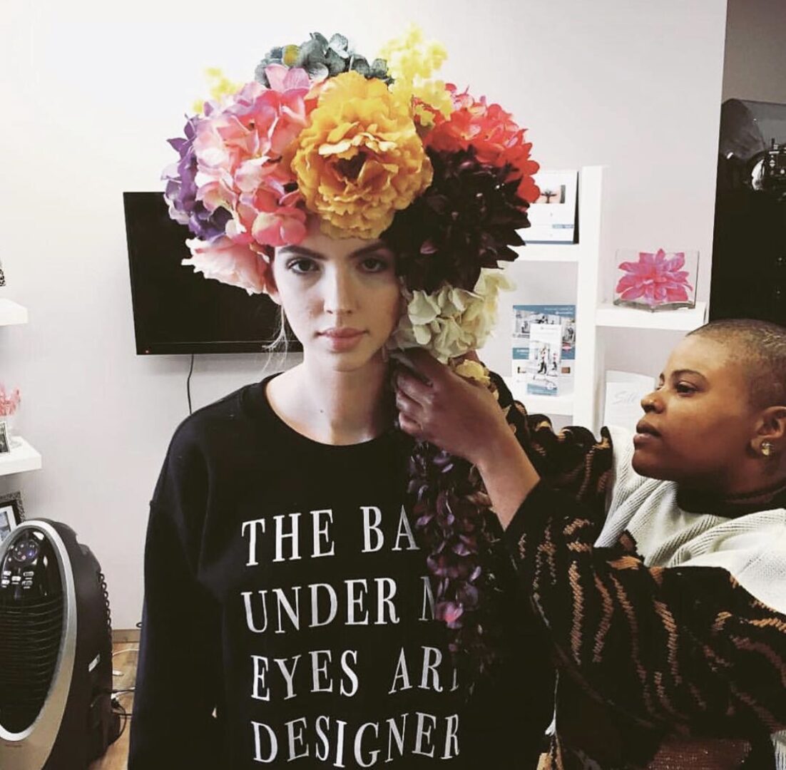Celebrity makeup and hairstylists from VCI Artists dressed up the model with a beautiful floral Headpiece.